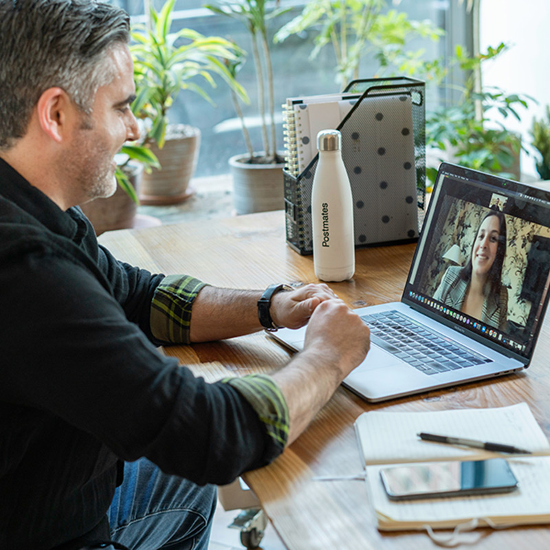 A Man Attending an Online Consultation